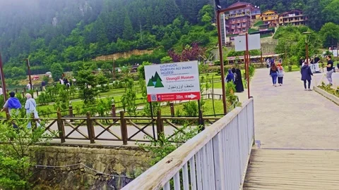 People walking on a bridge over a. Stock Footage 284636742