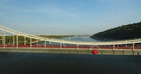 People Walking On A Bridge Over The River Stock Footage 95334863