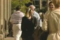 People walking on busy sidewalk Footage