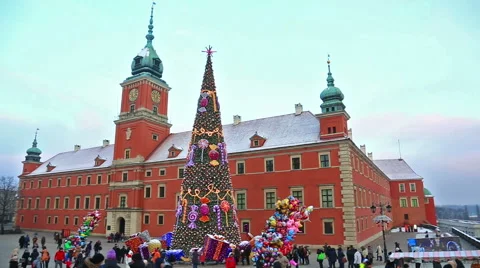 People walking at Castle square decorated for holidays, Warsaw Stock Footage 56424094