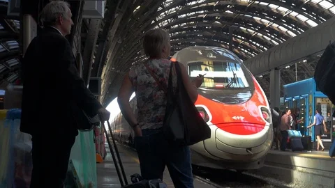 People walking in Central station in Milan, Italy, interior view, slow motion Stock Footage 103285146