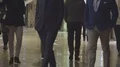 People walking city street at night, relaxed atmosphere in downtown, slow motion HD Footage