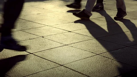 People walking crowd footsteps long shadows silhouettes 2 warm no fx Stock-Footage 45990358