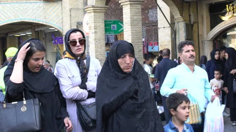 People walking by day outdoors in Tehran, Iran, 4K, DNxHR Video stock 151646292