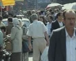 People walking down busy street SD Footage
