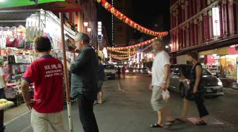 People walking down a crowded market in Chinatown, Singapore Stock Footage 59896060
