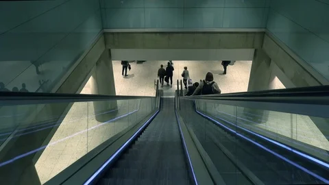 People walking down escalator Stock Footage 98192926