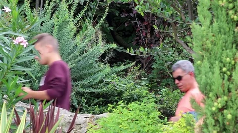 People walking down a footpath Stock Footage 78500163