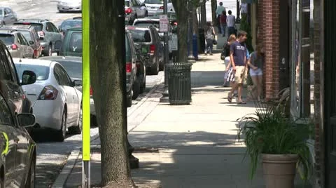 People walking down the sidewalk  (3 of 7) Stock Footage 10688687
