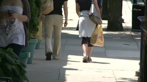 People walking down the sidewalk  (5 of 7) Stock Footage 10688671