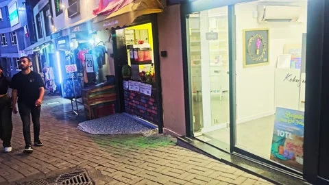 People walking down a sidewalk in front. Stock Footage 282999973