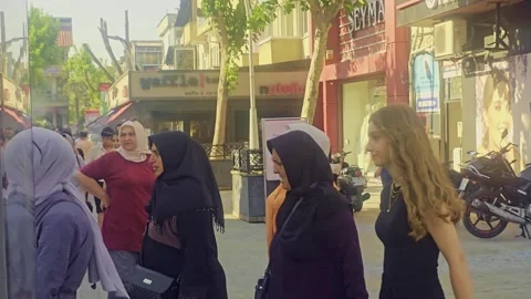 People walking down a sidewalk in front. Stock Footage 284649684
