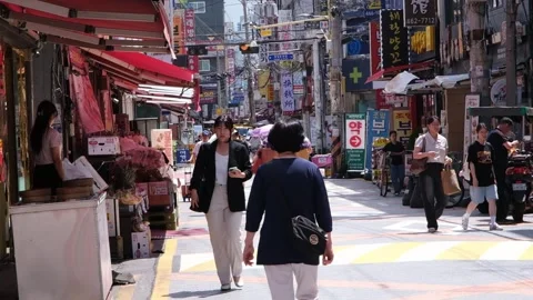 People walking down a small street in Seoul downtown, South Korea Video stock 342137442