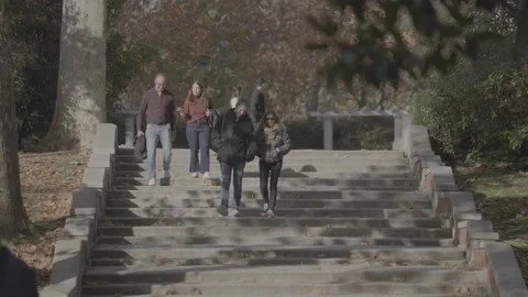 People walking down a staircase in Madrid, Spain Stock Footage 345030548