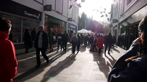 People walking down street during Christmas 스톡 동영상 108128904