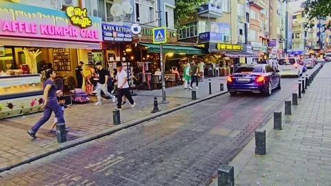 People walking down a street lined with. Video stock 284059953