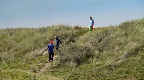 People walking in the Dunes Stock Footage 8830732