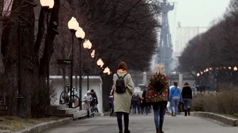People walking on evening park Stock Footage 62759142