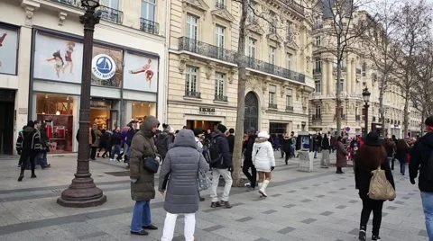 People walking in the famous Champs Elysees in Paris, France. Stock Footage 47015965