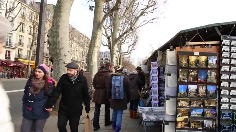 People walking at the famous galleries boxes along the Seine River in Paris Stock Footage 46787348