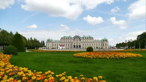 People walking in front of Belvedere Palace in time lapse Stock Footage