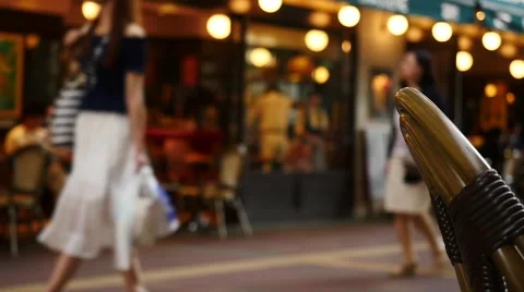 People walking in front of cafe in slow motion Stock Footage 63637796