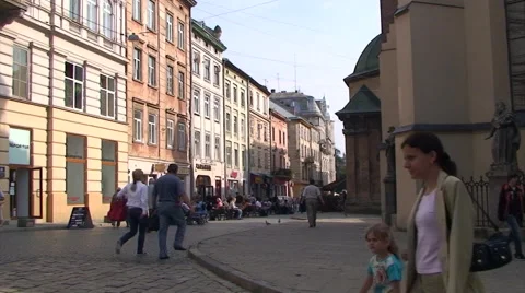 People walking in front of camera at Cathedral Square, Lviv Stock Footage 52036987