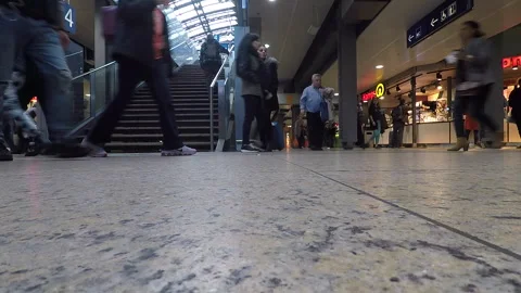 People walking in front of the camera at a Cologne train station Stock Footage 295432126