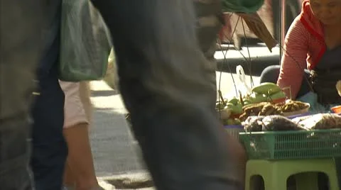 People walking by fruit Stock Footage 12761648