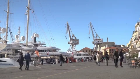 People Walking by a Harbour Stock Footage 83353580