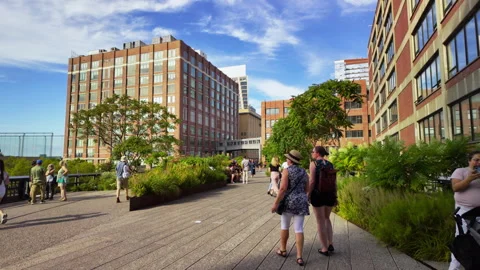 People walking on the High Line elevated park path in Chelsea Manhattan New York Stock Footage 327763841