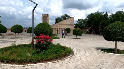 People walking at Imam Al-Bukhari memorial complex square in Bukhara Vídeos de archivo 336064236