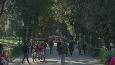 People walking inside Villa Borghese in Rome Stock Footage 105675243