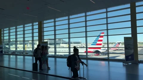People walking interior window view airplane DCA Ronald Reagan Airport DC Video stock 162319410