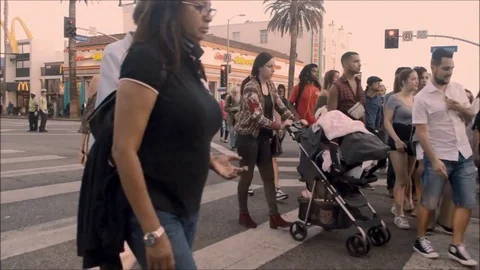 People Walking At An Intersection Stock Footage 81006142