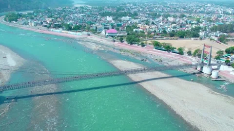 People walking on Janki Setu in Rishikesh, India  - 5th of June 2025 Stock Footage 311170991