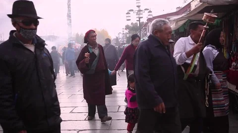 People walking in Lhasa, India Stock Footage 78022397