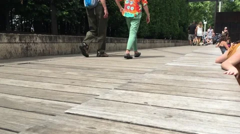 People walking millenium park boardwalk chicago Video stock 65817863