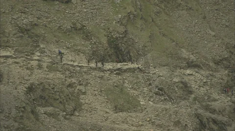 People walking on a mountain 스톡 동영상 37161097