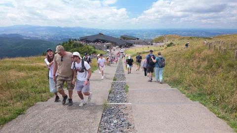 People walking on a mountain path of vulcano Puy de Dome Stock Footage 342943436