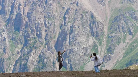 People walking in the mountains Stock Footage 299108932