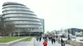 People walking near City Hall, Greater London Authority, Mayor, Thames River HD Footage