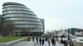 People walking near City Hall, Greater London Authority, Mayor, Thames River HD Footage