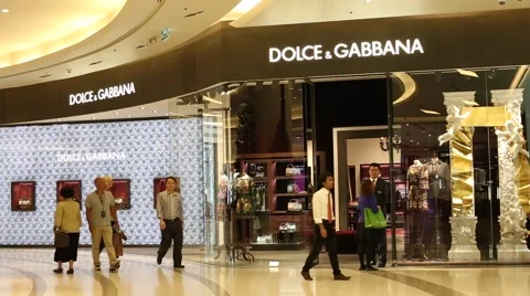 People walking near Dolce & Gabbana stor... | Stock Video | Pond5