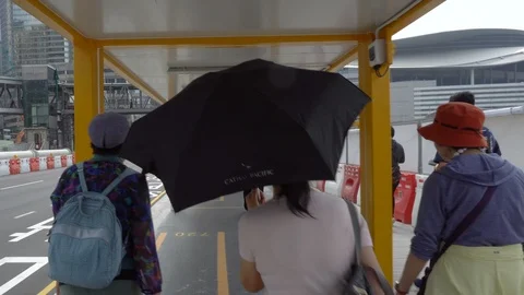People Walking Next To Construction Site In Hong Kong Stock Footage 90342712