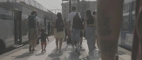 People walking next to the train in the station Stock-Footage 170898620
