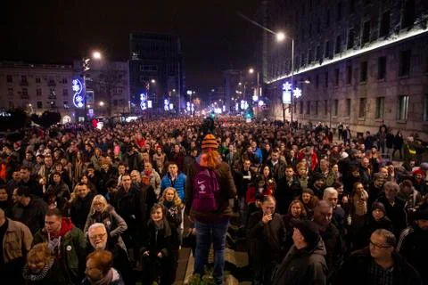 People walking at night Stock Photos