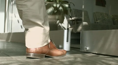 People walking Into office lobby through a glass door Stock Footage 61236596