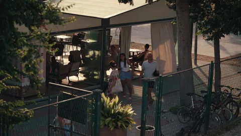 People Walking Outside Beach Cafe Stock Footage 340067358