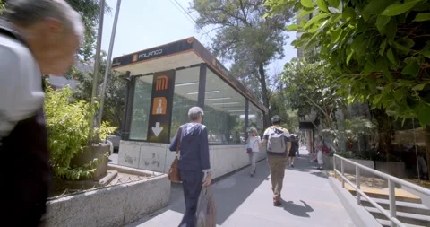 People walking outside of Polanco subway station in México City Stock Footage 250359950